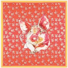  ?? Paul Smith ?? Paul Smith A playful red, square Chinese New Year silk scarf by the British label is peppered with pigs all over and has rolled, hand-stitched edges in pink and orange. $195. Available at paulsmith.com.