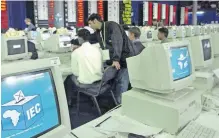  ?? AFP ?? ELECTORAL commission officials in the election centre in Pretoria in June 1999. Playing a vital role in democracy, the IEC has for 30 years avoided instabilit­y and managed to protect the integrity of the country’s elections. |