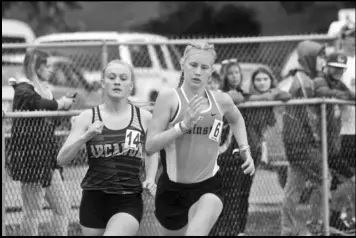  ?? Staff photos/Corey Maxwell ?? Area athletes from Minster, New Knoxville, New Bremen, Fort Loramie and Marion Local were part of the field at the Division III track and field regional meet at Troy on Friday night. Results from the meet will appear in Tuesday’s edition.