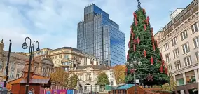  ?? ?? 103 Colmore Row towering over the German market in Victoria Square