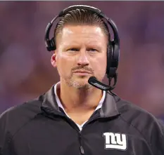  ??  ?? THE NEW YORK GIANTS cleaned house on Monday night, firing head coach Ben McAdoo (above) and general manager Jerry Reese in the midst of a 2-10 season. The breaking point appears to have been the benching of franchise quarterbac­k Eli Manning ahead of...