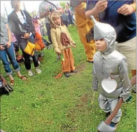  ??  ?? Nathaniel “Rocco” Ronsvalle, then- 3, of Lansing, N. Y., along with others, waits to be judged during the costume contest in Chittenang­o on June 2, 2012.