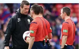  ??  ?? Seeking answers: Deila speaks to the officials at Hampden