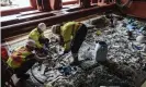  ??  ?? Crew members sort through plastic onboard a support vessel in the Pacific. Photograph: AP