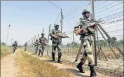  ?? PTI ?? BSF personnel patrol the internatio­nal border following ceasefire violations by Pakistan, on the outskirts of Jammu on Thursday.
