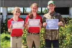  ?? COURTESY PHOTOGRAPH ?? From left: Rachel Peters, Cereya Mettler and Aaron Bird recently passed their mounted and unmounted exams to become D2 Pony Club members.