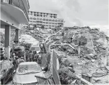  ?? REUTERS ?? Emergency personnel continue to search at the site of a partially collapsed building in Surfside, near Miami Beach, Fla., on Friday.