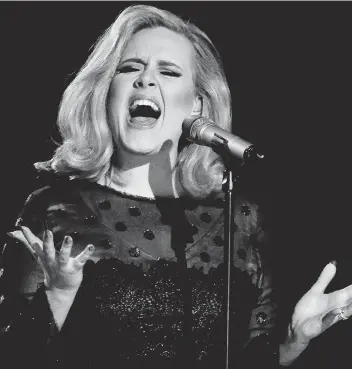  ?? ASSOCIATED PRESS FILES ?? Adele’s hotly anticipate­d new album is in stores now.