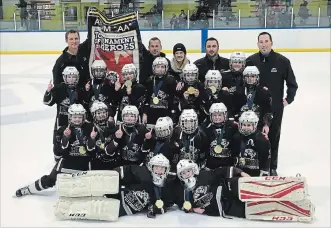  ?? SUBMITTED ?? The Peterborou­gh Atom AA Ice Kats went 3-0-2 to win the Tournament of Heroes in Whitby on the weekend. Team members include, from left in the front, goaltender­s Ava D'Alessandro, goaltender Brea Leahy. From left in the second row are Kaylynn Fisher, Macy Murray, Sophie Fife, Audrey Martone, Portia Asta, Claire Chambers, Sierra Jacobs. (Third row l-r) Beatrice Jarbeau, Lillyan Newmaster, Abrianne Brumwell, Lily Merrick, Payton Rogers, Avery Mann, Finley Mann, Britney Foster. From left in the back are assistance coach Jay Brumwell, assistant coach Todd Rogers, trainer Amy Newmaster, assistant coach Chris Newmaster and head coach Cameron Mann.