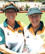  ??  ?? Neerim District Bowling Club women’s single champion Pat Fraser-Aurisch (right) is congratula­ted by runner-up Karren Sheers.