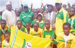  ??  ?? Former Minister of Sports, Barr. Solomon Dalung (2nd left), Permanent Secretary, Mr. Olusade Adesola pose for photograph with Ogun State contingent at last year’s National Youth Games