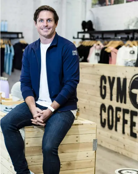  ??  ?? Niall Horgan, CEO of Gym+Coffee, at the athleisure brand’s pop-up store in Kildare Village. Photo: Don Moloney