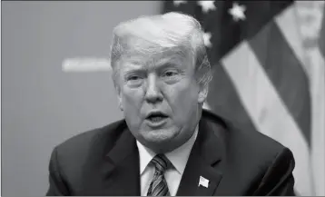  ?? ASSOCIATED PRESS ?? PRESIDENT DONALD TRUMP SPEAKS TO media about the death of former President George H. W. Bush, during his meeting with Germany’s Chancellor Angela Merkel at the G20 summit, Saturday, Dec. 1, 2018, in Buenos Aires, Argentina.