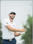  ?? NATHAN DENETTE — THE CANADIAN PRESS ?? Dustin Johnson shot a 65Saturday to get into a four-way tie for the lead at the RBC Canadian Open.