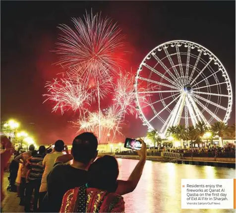  ?? Virendra Saklani/Gulf News ?? Residents enjoy the fireworks at Qanat Al Qasba on the first day of Eid Al Fitr in Sharjah.