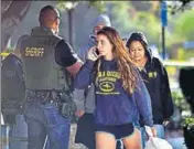  ?? AFP ?? People arrive at a family assistance centre following the shooting at the Borderline Bar and Grill in Thousand Oaks, California.