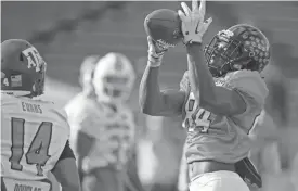  ?? GLENN ANDREWS/USA TODAY SPORTS ?? Grambling State receiver Chad Williams (84) catches a pass during Senior Bowl practice on Jan. 25 in Mobile, Ala. The Cardinals drafted Williams in the third round on Friday.