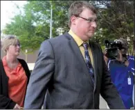  ?? Arkansas Democrat-Gazette/JEFF MITCHELL ?? Former Little Rock police officer Josh Hastings arrives with his mother, Jan, on Thursday at the federal courthouse in Little Rock.