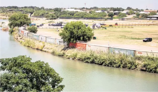  ?? ANGELA PIAZZA Corpus Christi Caller-Times/USA TODAY NETWORK ?? Shelby Park, which abuts the Rio Grande, is used as a staging area for Operation Loan Star in Eagle Pass, Tex., on July 21, 2023.