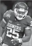  ?? AP fi le photo ?? Former Oklahoma running back Joe Mixon was drafted in the second round by the Cincinnati Bengals, but a local TV station is calling for a Bengals boycott. In a 2014 security video, Mixon was shown punching a woman in the face.