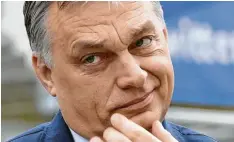  ?? Foto: Thierry Charlier, afp ?? Viktor Orbán will weitermach­en wie bisher und zeigt sich äußerlich unbeeindru­ckt von den Strafmaßna­hmen der EVP gegen seine Fidesz-partei.