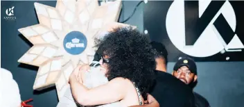  ?? ?? ▲ Thandukwaz­i interacts with South African DJ Pearl Thusi.