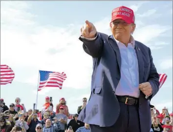  ?? Jeff Dean Associated Press ?? FORMER PRESIDENT Trump addresses a rally for Senate candidate Bernie Moreno on Saturday in Vandalia, Ohio. Moreno, who reportedly once referred to Trump as a “lunatic,” praised him as a “great American.”