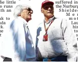  ?? TIME FOR A
CHAT: Niki Lauda and Bernie Ecclestone ??