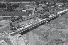  ?? XIE YONGBIN / CHINA NEWS SERVICE ?? The Phonethong super bridge, part of the China-Laos Railway, was completed on July 5.