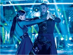  ??  ?? Electric: Katya Jones and Seann Walsh dance the paso doble last Saturday