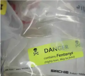  ??  ?? NEW YORK: (FILES) This file photo taken on September 22, 2016 shows bags of heroin, some laced with fentanyl, displayed before a press conference at the office of the New York Attorney General, in New York. Nine people died of fentanyl opioid abuse in...