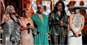  ?? AP ?? Lady Gaga, from left, Jada Pinkett Smith, Alicia Keys, Michelle Obama and Jennifer Lopez speak at the 61st annual Grammy Awards in Los Angeles.