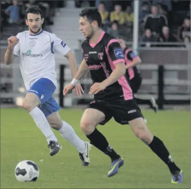  ??  ?? Eric Molloy of Wexford Youths steals a march on Josh Mailey (Finn Harps).