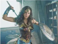  ??  ?? IN ACTION: Gal Gadot stars in ‘Wonder Woman,’ which is nothing more, or less, than an entertaini­ng blockbuste­r.