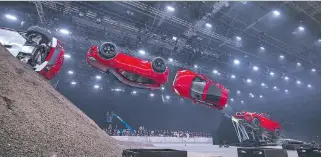  ?? PHOTOS COURTESY OF JAGUAR LAND ROVER ?? Jaguar and stunt driver Terry Grant set a new Guinness World Record for longest barrel roll at the global launch of the new Jaguar E-Pace in London this summer, as shown in this composite image. The 2018 E-Pace, a five-seat compact SUV, is the latest...