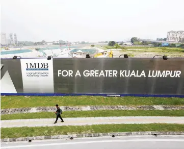  ?? – Reuters photo ?? 1MDB would need a huge amount of money to undertake its payment commitment of RM4.88 billion in 2016, RM14.74 billion in 2023, and RM5.14 billion on 2039.