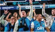  ?? Jacob Kupferman/Associated Press ?? Fans cheer before an MLS soccer match between Charlotte FC and the LA Galaxy last March.