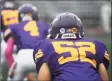  ?? ?? Westhill’s Jordan Napolitano wears a number 70 decal on his helmet in memory of teammate Jordan Martinez on Monday, in the team’s first game since his death, at Westhill High School in Stamford.