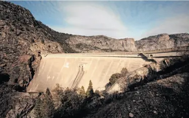  ?? Tomas Ovalle / Special to The Chronicle ?? O’Shaughness­y Dam would have to be torn down to restore the Hetch Hetchy area to its pristine state.