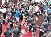  ??  ?? In this image made from video, lawmakers tussle during a parliament session in Taipei, Taiwan on Friday.