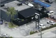  ?? CHRIS O’MEARA — THE ASSOCIATED PRESS FILE ?? In this file photo, law enforcemen­t officials work at the Pulse gay nightclub in Orlando, Fla., following the a mass shooting. Audio recordings of 911 calls released Tuesday, Aug. 30, by the Orange County Sheriff’s Office show mounting frustratio­n by...