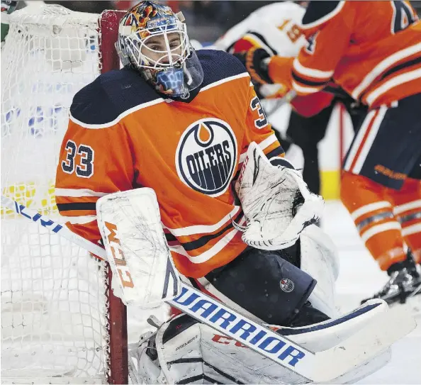  ?? IAN KUCERAK ?? Oilers goaltender Cam Talbot was at the top of his game on Thursday, making 34 saves in a 4-3 shootout win over the Flames.