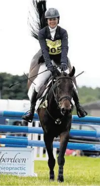  ??  ?? Heading for victory: Kilbarchan’s Fiona Malcolm guides Thebestof Three over the fences at Burgie