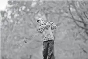  ?? [PHOTO BY IAN MAULE, TULSA WORLD] ?? Oklahoma’s Grant Hirschman watches his drive during the final day of the Big 12 Championsh­ips at Southern Hills on Wednesday.