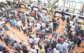  ?? FILE ?? The Constant Spring Tax Office, St Andrew, is filled to capacity on the last day of a traffic ticket amnesty in this 2012 file photo.