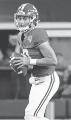  ?? MICHAEL AINSWORTH/AP ?? Alabama quarterbac­k Bryce Young looks to pass against Cincinnati in the Cotton Bowl.