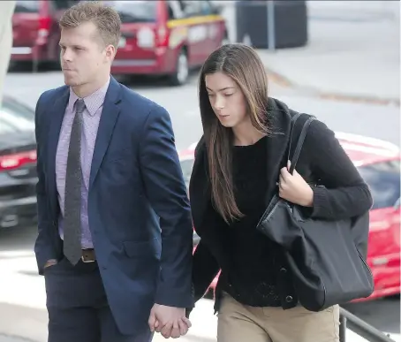  ??  ?? Ben Johnson, 22, and his wife Kate walk towards Ontario Superior Court of Justice on Tuesday. The former Windsor Spitfire was sentenced to three years in prison for sexually assaulting a 16-year-old girl in a washroom stall of a now-defunct downtown...