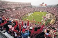  ?? AP FILE PHOTO ?? Bryant-denny Stadium in Tuscaloosa, Alabama is home to the University of Alabama Crimson Tide, one of the most storied college football programs in America. In Alabama, along with other southern states, college football is the only game in town.