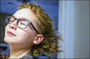 ?? DANIEL SHULAR/ST. LOUIS POST-DISPATCH/TNS ?? Lucas Desroche does the “mullet shake” he saw on Tiktok after styling his hair. “He looks like (former hockey star) Mario Lemieux in 1988,” said father Josh Desroche.