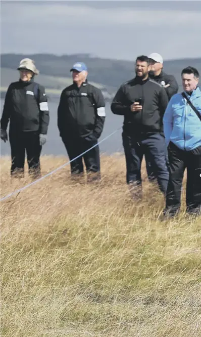  ??  ?? 0 Graeme Mcdowell plays his second shot from the rough at the 18th hole. The Irishman was quick to acknowledg­e the improvemen­t in the Castle Stuart course since he played there in 2011.